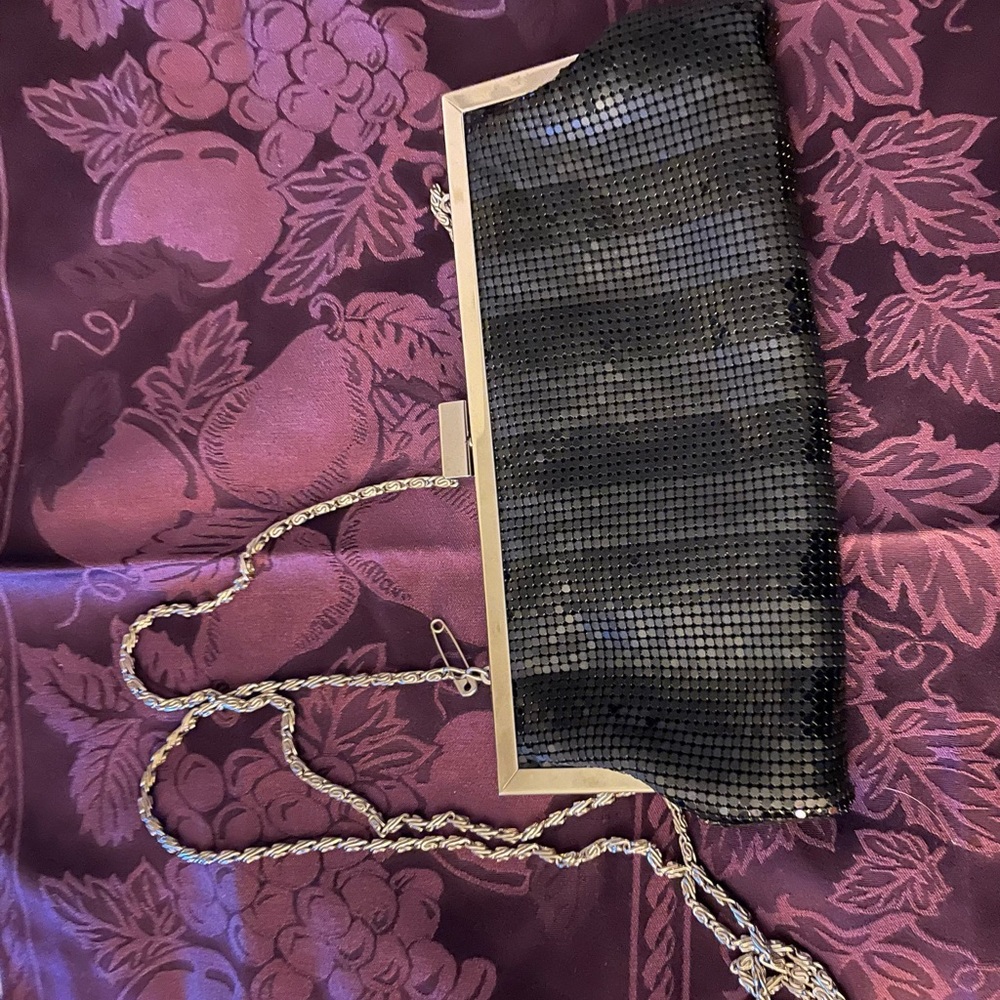 Black Sequin Handbag wit silver strap , small Circle mirror inside ..